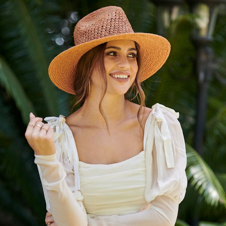 For a more versatile look this summer, wear our raffia fedora. This hat can be dressed up or down, at the beach or pool. It is crushable, so will retain its shape anywhere you take it during your travels. Features: Brim Size: 3.5" Adjustable 100% Raffia Women's one size Hand Crochet Ventilated Crown & Raffia Braid Brim Crushable - makes it easy to pack. Crochet Crown, Crown Braid, Hat Sizes, Hand Crochet, Panama Hat, Fedora, Stylish Women, Braids, Crown