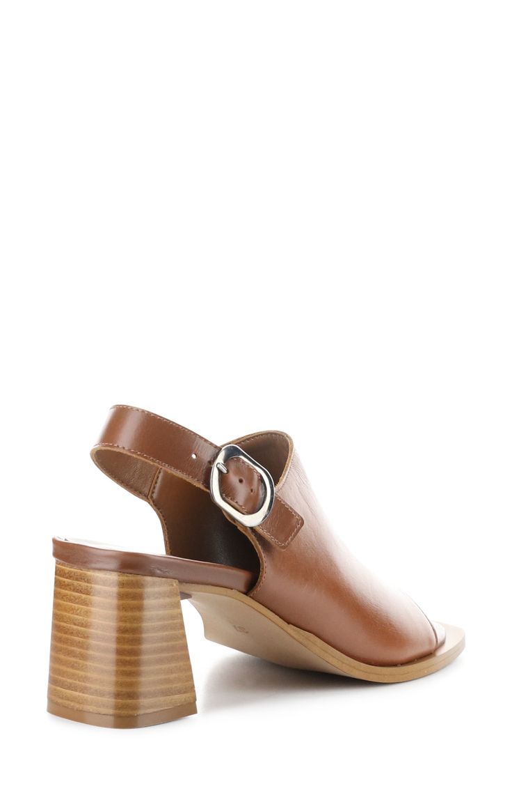 A squared-off toe and stacked block heel balance a slingback leather sandal set on a cushioned footbed for comfortable wear. 2 1/2" heel Adjustable slingback strap with buckle closure Cushioned footbed Leather upper/synthetic lining and sole Made in Italy Spring Slingback Pumps With Stacked Heel And Square Toe, Brown Slingback Mules For Spring, Spring Brown Slingback Mules, Casual Square Toe Heels With Stacked Heel, Brown Leather Block Heels With Padded Heel, Casual Mules With Wooden Heel And Square Toe, Casual Block Heels With Sculpted Heel And Square Toe, Casual Block Heels With Sculpted Square Toe, Casual Block Heels With Sculpted Open Heel