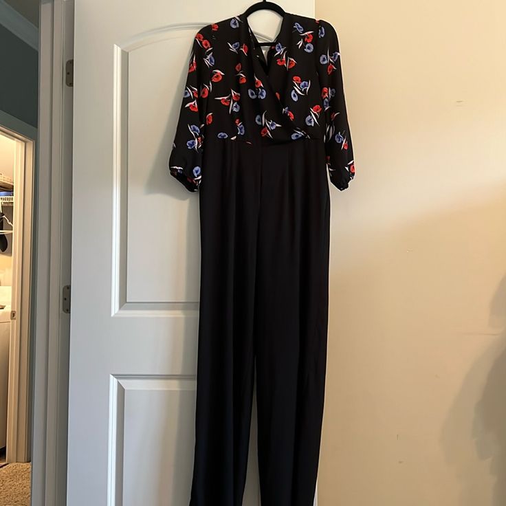 Super Cute Ann Taylor Black Jumper With Flowers. Zips In The Back Black Formal Pantsuit For Spring, Black Jumpsuit For Formal Spring Events, Spring Black Pantsuit For Night Out, Black Pantsuit For Spring Night Out, Black Pantsuit For Night Out In Spring, Black Jumper, Ann Taylor, The Back, Pant Jumpsuit