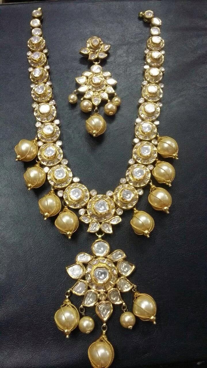 22k Gold South Sea Pearl Jadau Necklace set, diamond polki necklace Earring set, three piece jadau set 22k Gold approx 80-100 gms Diamond Polki 16-20 carats South Sea Pearls 150-180 carats Clip and pearl wire 18 kt gold Temple Jewelry Kundan Bridal Necklace With Rose Cut Diamonds, Bollywood Bridal Kundan Necklace With Rose Cut Diamonds, Bollywood Style Bridal Necklace With Rose Cut Kundan Diamonds, Bollywood Bridal Necklace With Rose Cut Diamonds And Kundan, Bollywood Style Bridal Necklace With Rose Cut Diamonds, Hand Set Kundan Bridal Necklace In Yellow Gold, Diamond Kundan Necklace For Diwali Gift, Diamond Kundan Temple Jewelry Necklace, Diamond Kundan Necklace In Temple Jewelry Style