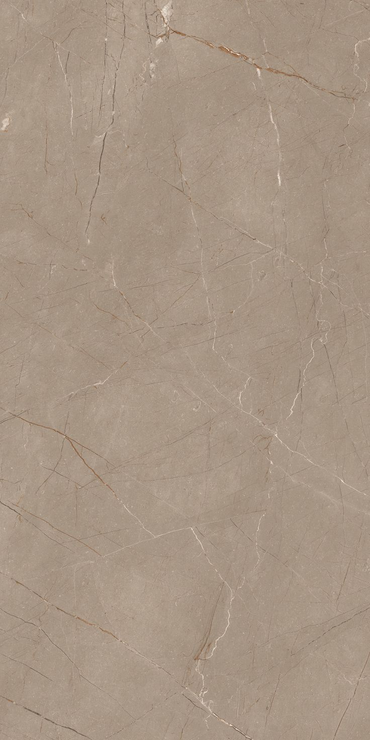 a beige marble textured surface with some brown lines on the top and bottom part