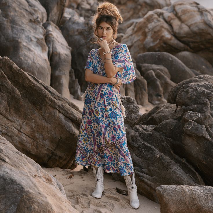 Be free and flirty in this gorgeous boho floral dress featuring a super feminine and flattering cut. Whether your out on the town, an event or headed to the beach, you will turn heads in this gorgeous flowy dress! Specs: Material: Rayon V-neck Floral Print Maxi Dress For Beach, Multicolor Floral Midi Dress For Beach, Flowy V-neck Beach Dress With Tropical Print, Bohemian V-neck Maxi Dress With Floral Print, Bohemian V-neck Floral Print Maxi Dress, Flowy Midi Dress For Spring Beach Cover-up, Flowy V-neck Midi Dress For Beach, Spring Hippie Flowy Maxi Dress, Hippie Spring Flowy Maxi Dress