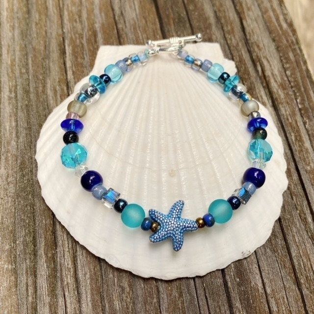 Turquoise Starfish Beaded Bracelets, Ocean-inspired, Ocean-inspired Turquoise Starfish Beaded Bracelets, Turquoise Beaded Bracelets With Starfish Charm, Blue Bracelets With Starfish Charm Ocean-inspired, Ocean-inspired Blue Starfish Bracelets, Blue Bracelets With Starfish Charm And Round Beads, Blue Beaded Bracelet With Starfish Charm, Blue Bracelet With Starfish Charm And Round Beads, Turquoise Ocean-inspired Bracelet With Starfish Charm