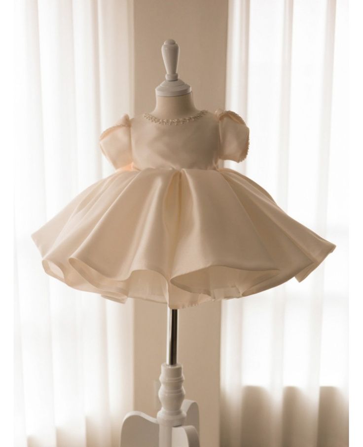 Get 10% off now! Buy elegant white ruffled satin ballgown toddler flower girl dress with pearls at cheap price online. Free stable shipping and pro custom service since 2009. Elegant Princess Dress With Ruffles For First Communion, First Communion Ball Gown With Ruffles, Princess Style Satin First Communion Dress, Princess Style Satin Ball Gown For Pageants, Elegant Wedding Princess Dress, Elegant Ruffled Pageant Dress For First Communion, Satin Princess Dress For Dress-up, Satin Ruffle Dresses For Baptism, Satin Ball Gown With Satin Bow For Wedding