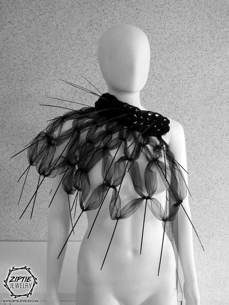 A SIGN OF COSMIC EXPANSION - FOR HIGH FASHION LOVERS + The base of this Shoulder wrap / Spike Capelet is made from high quality tule and zip ties + + The Shoulder wrap / Capelet is very soft, flexible, really comfortable to wear + + One size fits all + + The Capelet is secured on the back with a ribbon/knot + + It can be worn in various styles + + Explore the rest of my outstanding collection + Thank you for choosing Ziptie Jewelry, Renata Ziptie Jewelry, Lace Cover Up Wedding, Spikes Fashion, Circus Fashion, Ribbon Knot, Wedding Capelet, Bloom Fashion, Bridal Capelet, Wedding Bolero