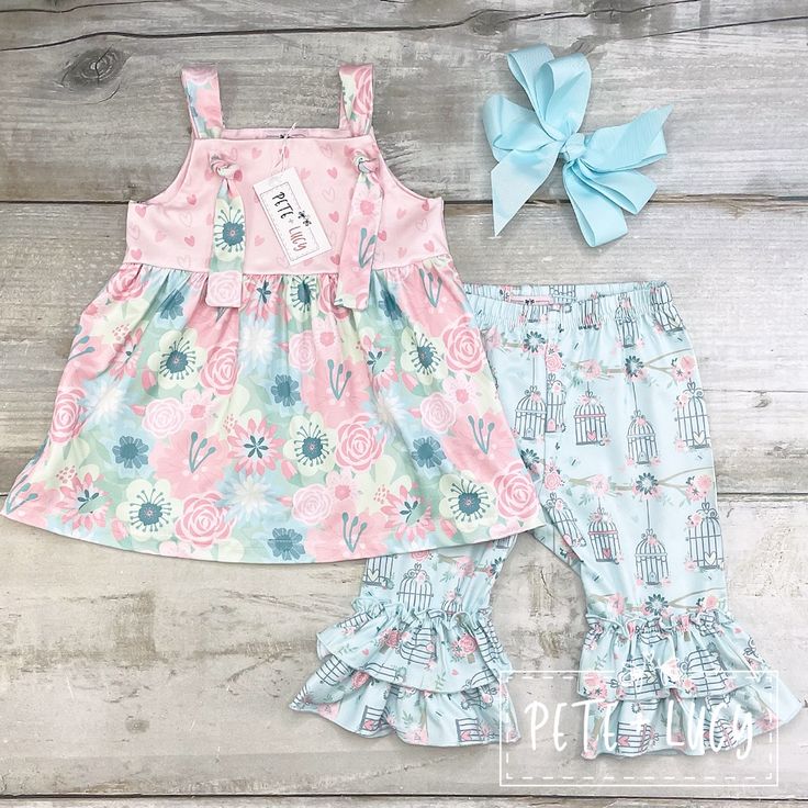 Cute 2 Piece Short Set With A Pink Top And Blue Bottoms. Playful Spring Sets For Playdate, Playful Sets For Playdate In Spring, Cute Pink Sets For Spring, Cute Light Blue Sets For Playwear, Cute Blue Sets For Playdate, Playful Pink Spring Sets, Playful Light Blue Sets For Spring, Pink Matching Set For Spring, 2 Piece Short Set