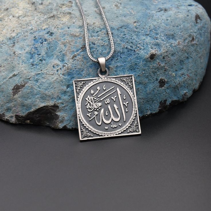 Allah Engraved Silver Necklace, Islamic Silver Necklace, 925 Sterling Silver Necklace, Best Gift ✦ Details ✦ * Material: 925 Sterling Silver * Weight of pendant :6,30  gram. * Chain Weight :             20 Inches = 5.00 Gr             22 Inches = 5.60 Gr             24 Inches = 6.05 Gr             26 Inches = 6.70 Gr             28 Inches = 7.10 Gr * Sides oxidized * Stamp: 925 ✦ Shipping ✦ * Processing time: 1-3 business days. * This item ships from my Turkish workshop in Istanbul. * Add your p Silver Engraving, Luxury Gift Box, Sterling Silver Necklace, Best Gift, Sterling Silver Necklaces, Allah, Jewelry Necklace Pendant, Silver Necklace, Best Gifts