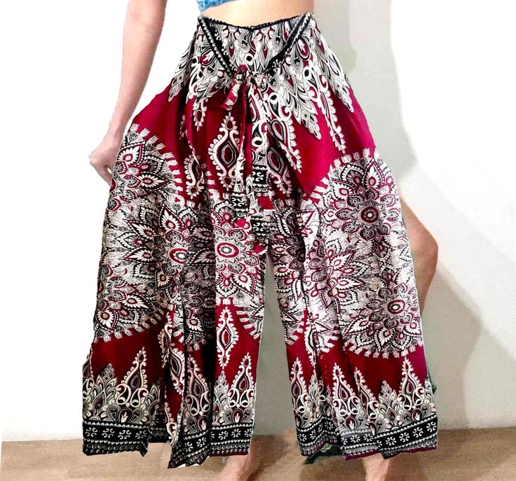 Thai Feather Art Boho Wide Leg Yoga Pants: Hippie Style Fisherman Palazzo Trousers String Tie Wrap pants Beach Wear SPECIAL STYLE OUR DESIGN ...ONLY HERE FROM OUR STORE + Adorable and luxurious wrap pants with a cute style + Vibrant colors and lovely floral print for a charming look + Flexible fit with string tie front and back + Perfect for all special occasions, adding a touch of elegance to your ensemble THIS 'S SO PRETTY MADE WITH HEART  ... feel great with good looks thai  rayon 100% MEASUREMENT:(please use as an estimate) Waist: lay flat side-side: 31"  (round 28"-46") HIP :  lay flat side-side: 32"  (round 60") Length from top to hem: 39"  ---------------------------- Wholesale available - made to order ---------------------------- we do measurement in inch. we are always happy to h Bohemian Printed Summer Bottoms, Bohemian Printed Bottoms For Summer, Bohemian Printed Bottoms For Vacation, Multicolor Ankle-length Bottoms For Summer, Hippie Printed Bottoms For Summer, Summer Cotton Printed Harem Pants, Bohemian Red Pants For Beach, Bohemian Red Pants For The Beach, Red Bohemian Pants For Beach