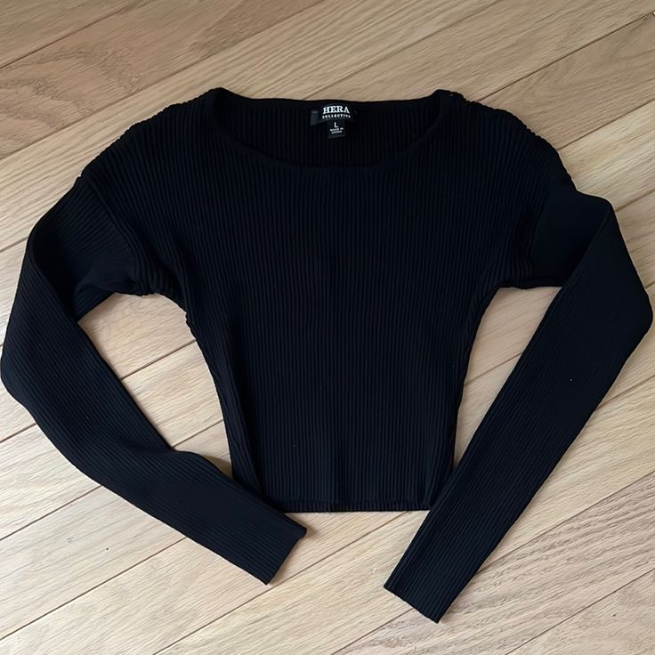 Tags Off But Never Worn. Stretchy Ribbed Black Basic Shirt. Cropped With Long Sleeves. Size L. 70% Rayon, 30% Nylon. Hand Wash Cold. Hang To Dry. Ribbed Fitted Top For Night Out, Trendy Ribbed Tops For Night Out, Solid Ribbed Top For Night Out, Edgy Ribbed Stretch Tops, Black Ribbed Fitted Tops, Black Fitted Ribbed Top, Ribbed Crop Top For Layering, Black Ribbed Crew Neck Crop Top, Chic Black Top With Ribbed Neckline