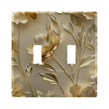 a decorative light switch plate cover with flowers on the wall and two toggles