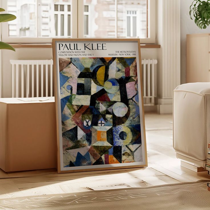 an art piece is displayed in front of a window with the word paul klee on it