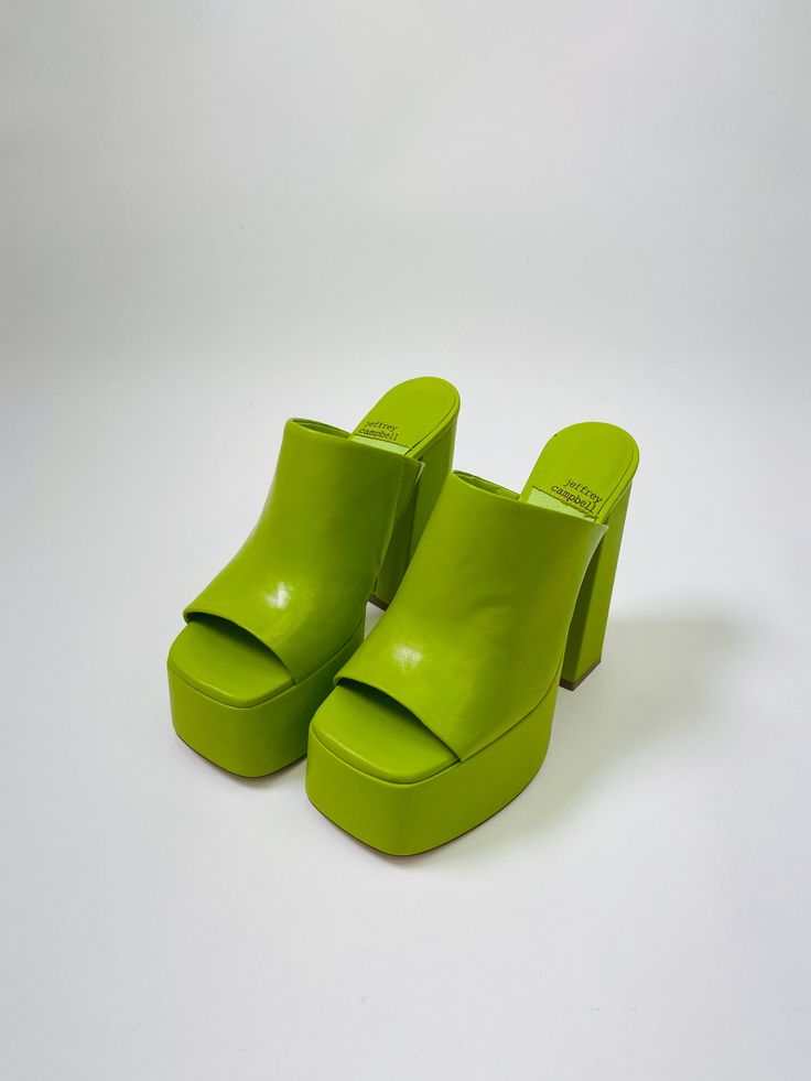 Fall in luv with the the Luna Luv Platform Mule in light green! These chunky open-toe platforms are both playful and elevated, and pair perfectly with any flare bottom. Pair it with the Lennon Joyride High Rise Boot Cut Denim Jean for a night out or channel your Y2K vibes and pair them with your favorite mini skirt! Measurements and Materials: Faux leather upper with manmade sole Made in China Slip-on styling Leather lining Approx 133mm/ 5.25 inch heelApprox 50mm/ 2 inch platform Random Clothes, Fall In Luv, Skirt Measurements, Platform Mules, Y2k Vibes, Cute Boutiques, Boot Cut Denim, These Girls, Denim Jean