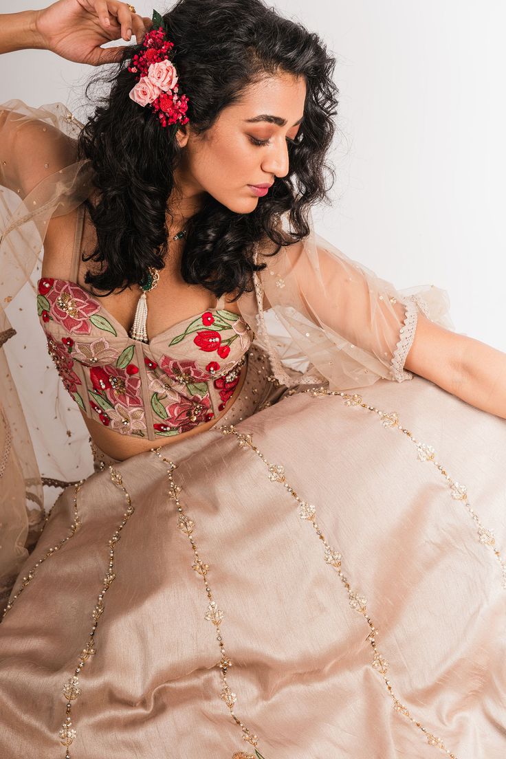 Beige lehenga with applique embroidered floral motifs. Comes with crop top and jacket.
Components:3
Embroidery
Neckline:Top: Sweetheart
Sleeve Length:Top: Sleeveless; Jacket: Asymmetric
Fabric:Raw Silk, Tulle
Color:Beige
Sequin and pearl embroidered motifs on skirt
Applique embroidered floral motifs and sequin and pearl motifs on top
Sequin motifs and lace trim border on sheer jacket - Aza Fashions Beige Lehenga, Jacket Lehenga, Sheer Jacket, Sleeveless Jacket, Fashion App, Embroidered Jacket, Sweetheart Neck, Embroidered Silk, Raw Silk