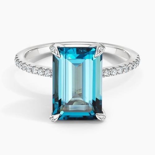 Fiesta London Blue Topaz and Diamond Cocktail Ring Luxury Sapphire Ring With Emerald Cut And Gemstone Accents, Luxury Emerald-cut Sapphire Ring With Gemstone Accents, Luxury Emerald Cut Sapphire Ring With Gemstone Accents, Luxury Blue Topaz Baguette Cut Rings, Elegant Topaz Ring With Cubic Zirconia Accents, Modern Topaz Ring With Gemstone Accents For Formal Occasions, Luxury Blue Topaz Ring With Diamond Accents, Elegant Diamond Topaz Ring With Gemstone Accents, Modern Emerald Cut Topaz Ring