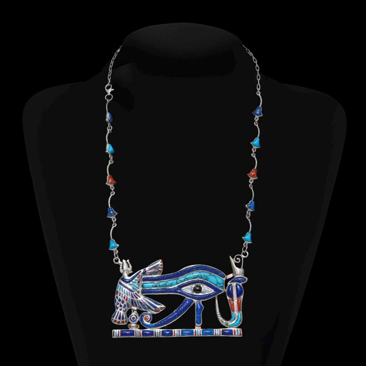 Vintage Unique Egyptian Necklace Eye of Horus Ra Handmade Gemstone Silver from 1975  They are beautiful works of art and craftsmanship, an excellent addition to any collection. Material: Silver, Lapis Lazuli Stone and turquoise stone, Agate Stone Size height: 30.cm   12,inch Size Pendant Eye of Horus: 10x7.cm Weight: 126.Gram  Shipping We Ship from DHL Fast Shipping Is 7 Days with a Tracking Number  Thank You for Shopping at Egypatra Store. Spiritual Jewel Pendant Necklace, Spiritual Pendant Necklace With Jewels, Collectible Ankh Amulet Necklace, Ceremonial Pendant Necklace With Jewels, Silver Ankh Jewelry, Symbolic Handmade Ceremonial Necklaces, Silver Ankh Necklace For Ceremonial Use, Silver Ankh Necklace For Ceremonial Occasions, Unique Silver Ankh Jewelry