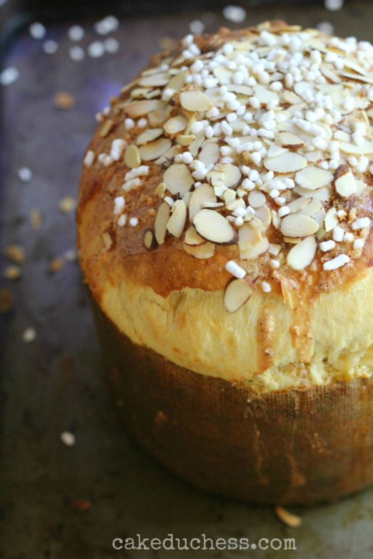 a loaf of bread with almonds on top