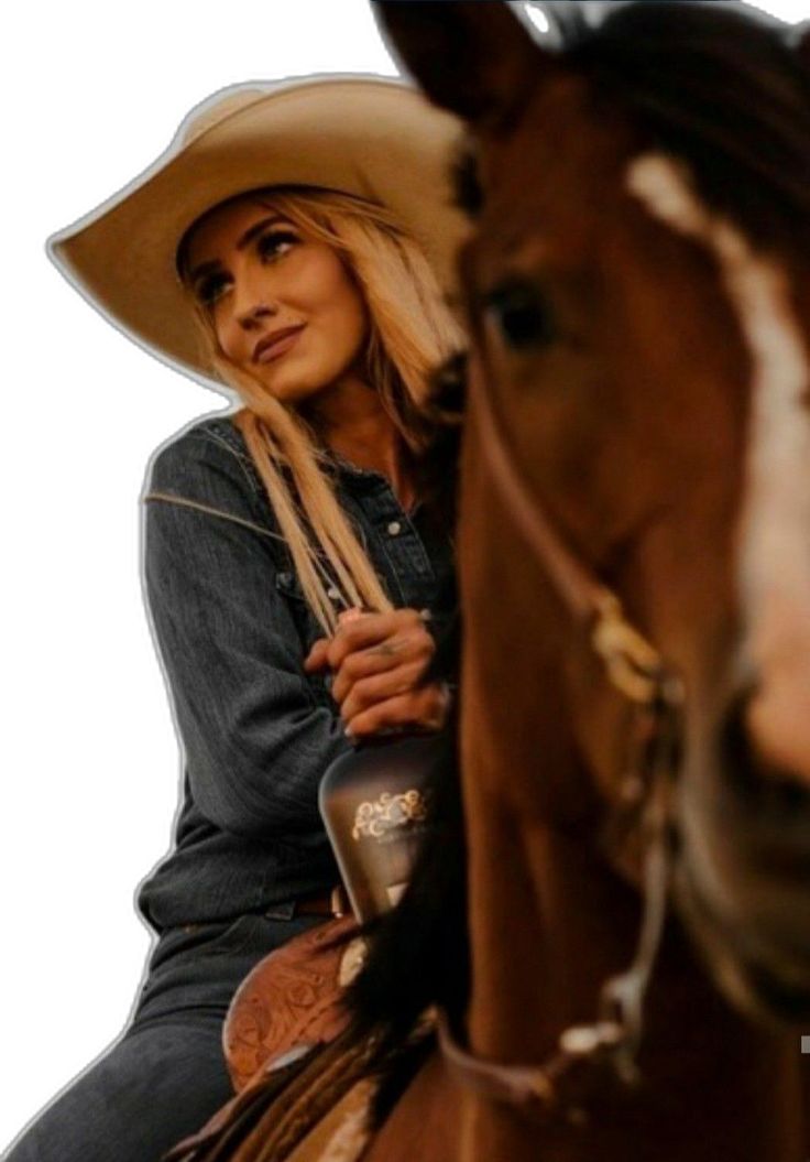 a woman wearing a cowboy hat riding on the back of a brown horse