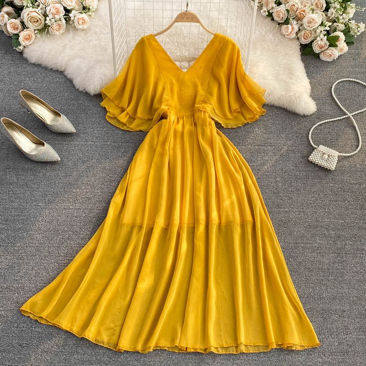 Yellow chiffon A line dress yellow fashion dressFabric: chiffonColor: yellowSize(cm): S, M, L, XL(1inch=2.54cm)S length 124cm bust 88cm wiaist 68cmMlength 125cm bust 92cm wiaist 72cmL length 126cm bust96cm wiaist 76cm&ltp&gtXL length 127cm bust 100cm wiaist 80cm&lt/p&gt&ltbr/&gt&ltp&gtPlease check the size carefully when you choose items.&lt/p&gt&ltbr/&gt&ltp&gtFor more pictures of the dress, please contact us, thank you.&lt/p&gt&ltbr/&gt Chic A-line Chiffon Dress For Beach, Chiffon A-line Beach Dress, Yellow Chiffon A-line Dress, Solid V-neck Chiffon Dress For Summer, Yellow A-line Maxi Dress With Ruffles, Solid V-neck Chiffon Summer Dress, Yellow Solid Color Sundress, Yellow A-line Midi Dress Solid Color, Yellow Chiffon V-neck Maxi Dress