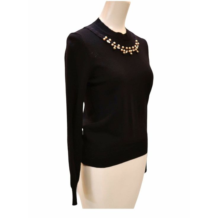 Comme des Garçons black knit mock neck sweater embellished with pearls and crystals around neck. Luxury Black Sweater For Formal Occasions, Elegant Wool Sweater For Formal Occasions, Elegant Fine Knit Crew Neck Sweater, Elegant Fine Knit Sweater For Evening, Formal Black Fine Knit Sweater, Black Crew Neck Sweater For Evening, Chic Embellished Fitted Sweater, Elegant Crew Neck Sweater For Work, Elegant Fall Party Sweater