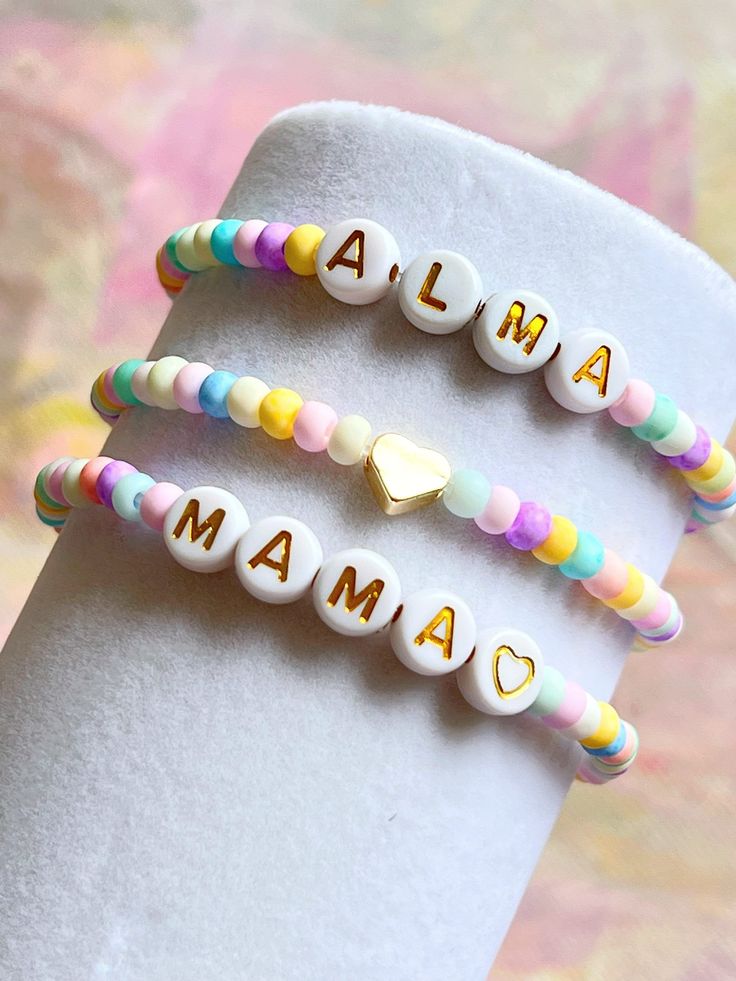 Colorful bead bracelets are so stunning and chic and makes a great gift ! Customized just for you ❣️ They are perfect for mixing, matching and stacking.  This listing is for One bracelet. You can choose name/ heart/mama style or all of them.  -4mm seed beads - 4mm gold filled bead  - 7mm letter of your choice  Can be personalized. 🤍 ⭐️ Customise a bracelet with your name or someone you love name on it ! Special orders are always welcome ❣️ Bracelets are made with transparent stretchy quality je Colorful Bead Bracelets, Kids Bracelet, Mini Bracelet, Bracelet Rainbow, Bracelet Heart, Kids Bracelets, Seed Bead Bracelet, Wedding Jewelry Bracelets, Name Bracelet