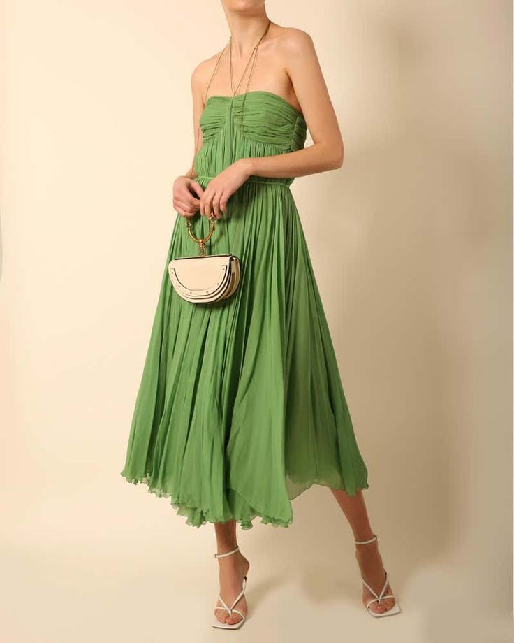 For Sale on 1stDibs - Chloe Spring Summer 2004 strapless plisse green silk dress Boning to the upper portion Cinched in waist Long rope ties with beaded ends wrap around the Spring Bandeau Dress With Pleated Bodice, Summer Cocktail Strapless Pleated Dress, Green Bandeau Strapless Dress For The Beach, Green Bandeau Strapless Dress For Beach, Summer Evening Strapless Pleated Dress, Spring Strapless Bandeau Dress With Pleated Bodice, Green Silk Dress With Ruched Bodice, Green Strapless Dress With Pleated Bodice, Green Pre-draped Dress With Pleated Bodice