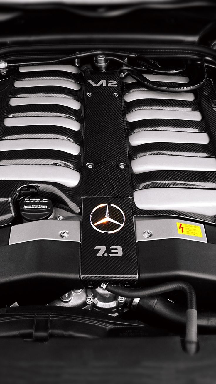 the engine compartment of a mercedes c - class sedan