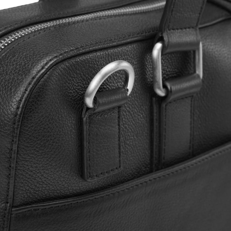 a black leather briefcase with metal handles