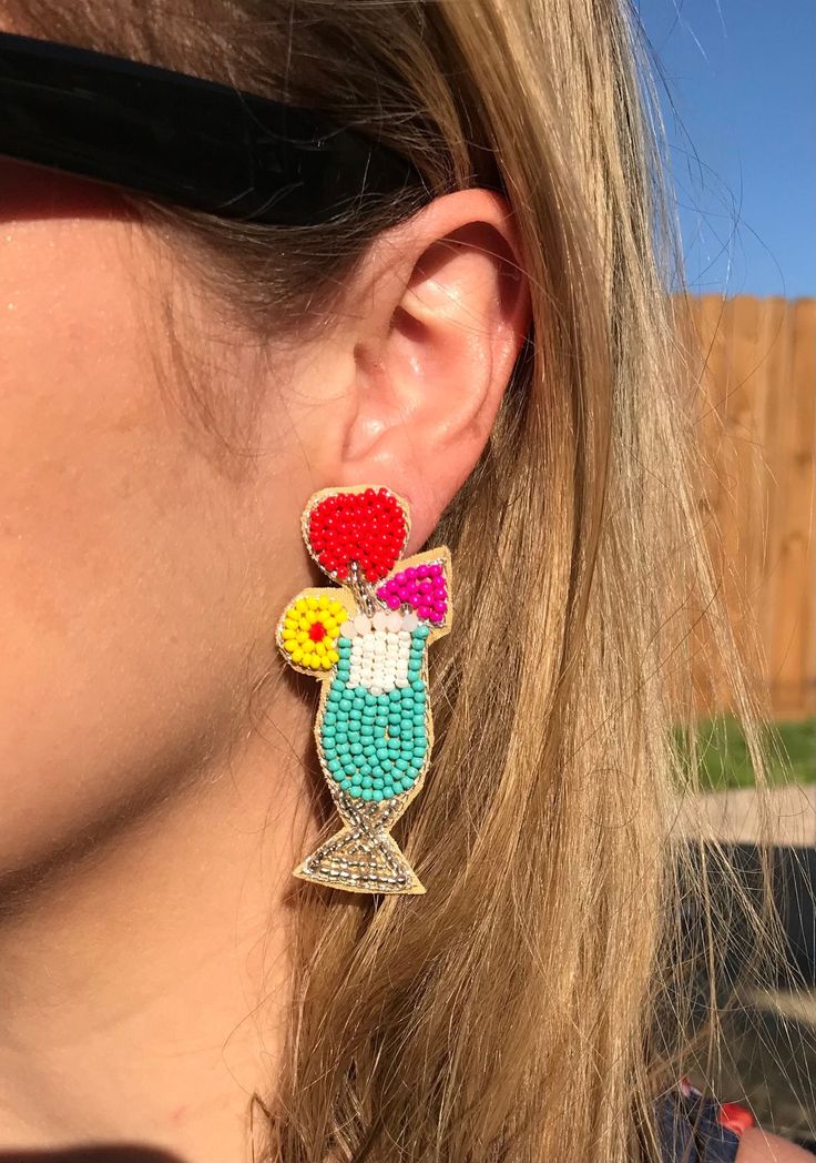 "Summertime is on the way! These lightweight earrings are perfect for pool parties, backyard bbq's, tropical vacations or just everyday wear! Approximately 2.5\" by 1\"" Casual Summer Party Earrings, Trendy Beach Earrings With Colorful Beads, Multicolor Fun Earrings For Vacation, Fun Multicolor Earrings For Vacation, Trendy Multicolor Beaded Earrings For Summer, Playful Summer Party Jewelry, Multicolor Summer Earrings, Fun Dangle Earrings For Beach, Beaded Jewelry For Beach Season Parties