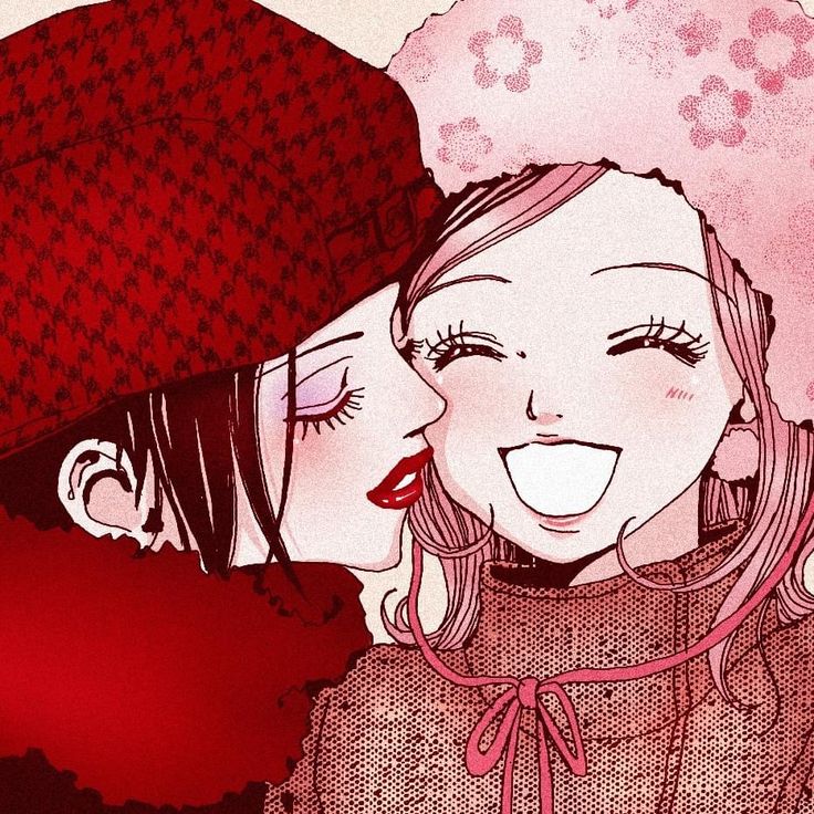 two women are kissing each other in front of a pink background