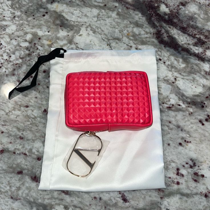 - 100% Authentic Condition: Brand New Color: Valentino Red / Gold Hardware Approximate Dimensions: 6.75” Length X 4” Height X 1.5” Width Compact Red Travel Bag, Chic Red Rectangular Pouch, Compact Red Bag For Daily Use, Trendy Red Pouch With Zipper, Rectangular Red Coin Purse For Travel, Red Coin Purse With Removable Pouch, Trendy Red Coin Purse As Gift, Trendy Red Coin Purse For Gift, Chic Coin Purse With Zipper Closure As Gift