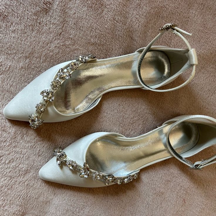 Ivory Colored Flats With Silver And Crystal Accents Would Be Perfect Wedding Shoes! Never Worn, In Perfect Condition White Flat Heel Wedding Shoes With Rhinestones, White Crystal Embellished Shoe Clips For Wedding, Cream Flat Heel Wedding Shoes For Party, Cream Flat Heel Wedding Shoes, Elegant Flat Heel Wedding Shoes For Bridal Shower, White Low Heel Wedding Shoes For Reception, White Flat Heel Wedding Shoes, Low Heel Wedding Shoes With Rhinestones, White Embellished Flat Heel Wedding Shoes