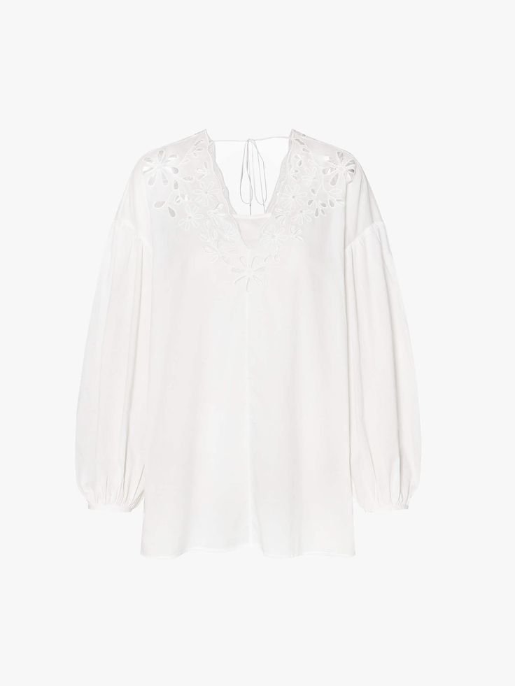 MO&Co. Women's Volume Sleeves Cotton Blouse Made from 100% cotton, this blouse is soft, breathable, and comfortable to wear. Designed with a charming Broderie Anglaise design, the V-neckline adds a touch of elegance, while the volume sleeves add a playful, modern twist. Pair it with your favorite jeans or a skirt for a chic look. Features : - Regular fit- V-neckline and volume sleeves- Delicate broderie anglaise design Code: MBD2TOPT52The back length of size S is 50.3cmMATERIALS & CARE Material: