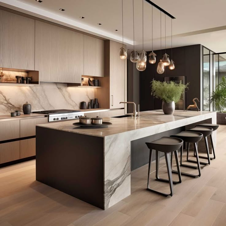 a modern kitchen with marble counter tops and wooden flooring