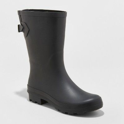 Be prepared for rainy days with the Vicki Mid-Calf Rain Boots from A New Day™ close at hand. In a solid hue, these rubber rain boots are easily to coordinate with your outfit, so you don't have to sacrifice style for staying dry. The buckle and extended panel on the back give you a comfortable fit that lets you move through your day with ease. Country Housewife, Capsule Wardrobe Style, Mountain Trip, Rain Boots Women, College Freshman, Black Rain Boots, Chelsea Rain Boots, Black Rain, Horse Gear