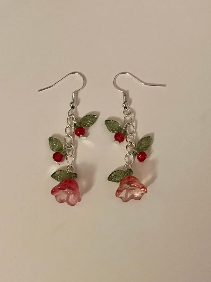 'Blooming Beauty' handmade dangling earrings, perfect for valentine's day!  These gorgeous flower earrings are available in multiple colours and are bound to be gratefully received by your partner, bestie, or even as a gift to yourself this v-day.  The Blooming Beauties are decorated with two small bead and leaf charms, as well as a statement flower and leaf at the end of the chain.  Colours may vary in quantity and price.  All orders are highly appreciated and made with the most love and care <3 Handmade Flower Earrings For Valentine's Day, Handmade Drop Flower Earrings For Valentine's Day, Coquette Vintage, Dainty Jewellery, Gelang Manik-manik, Valentine Gifts For Girlfriend, Gelang Manik, Gift Girlfriend, Beads Bracelet Design