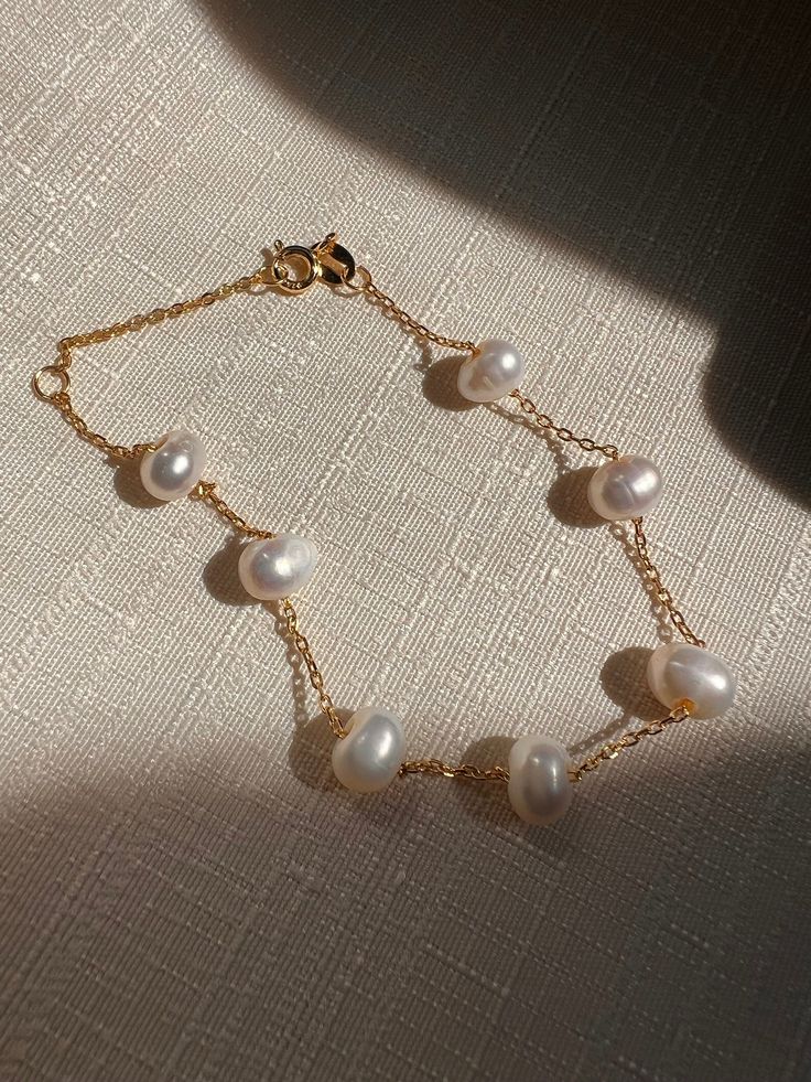 Elegant Gold Bracelet With Baroque Pearl, Elegant Baroque Pearl Bracelet With Pearl Charm, Elegant Gold Baroque Pearl Bracelet, Elegant Bracelet With Baroque Pearl Charm, Elegant Pearl Drop Bracelet As Gift, Gold Baroque Pearl Bracelets For Wedding, Elegant Handmade Pearl Bracelet Gift, Elegant Baroque Pearl Beaded Bracelets As Gifts, Elegant Pearl Drop Bracelet For Gift