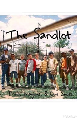 a group of men standing next to each other in front of a baseball bat