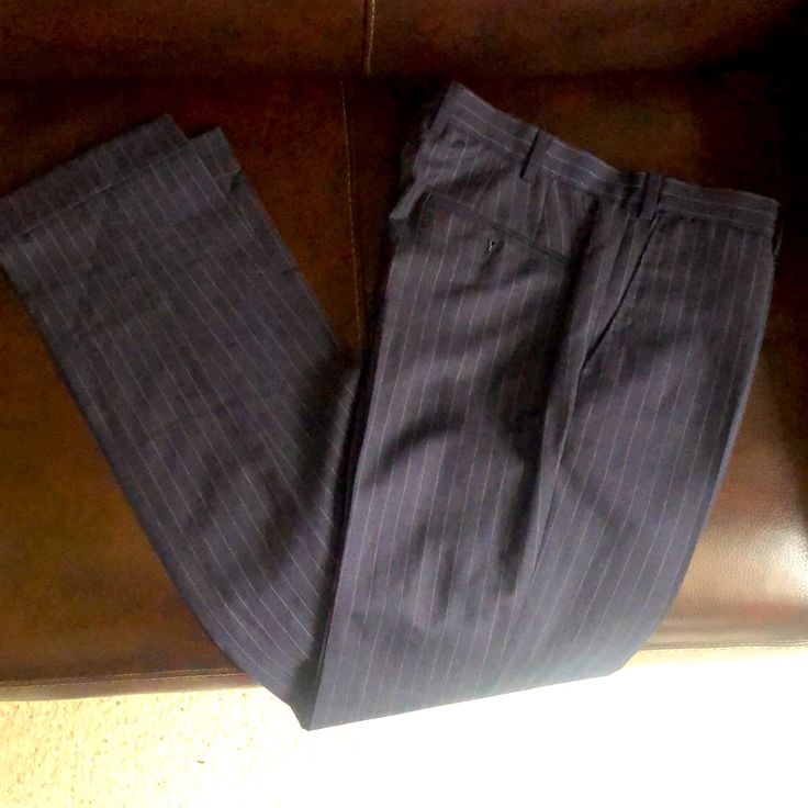 Excellent Condition Wool-Silk Linen, Italian Fabric, Made In Portugal. Perfectly Tailored Quality In This Great Pair Of Pants. These Stylish Pinstripe Pants Are Lightweight And Are Perfect With A Dress Shirt And Shoes, No Tie Needed. They Also Pair Well With A Summer Camp Or Polo Shirt And Loafers. No Flaws, Tears, Or Imperfections. They Measure W31 L34. Cuffed At The Ankles. A Classic Look For Work, Leisure, Or Date Night. This Luxury Dress Pants Priced Well Below Their Worth. Make An Offer Now Classic Fitted Silk Dress Pants, Fitted Classic Silk Dress Pants, Fitted Silk Dress Pants With Pressed Crease, Classic Silk Dress Pants With Straight Leg, Classic Silk Straight Leg Pants, Classic Silk Straight Leg Dress Pants, Silk Pants With Pressed Crease For Semi-formal, Silk Pants With Pressed Crease For Semi-formal Occasions, Semi-formal Silk Pants With Pressed Crease