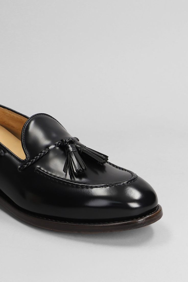 Loafers In Black Leather Classic Black Slip-on Tassel Loafers, Classic Black Slip-ons With Brogue Detailing, Black Leather Loafers With Brogue Detailing, Black Slip-on Tassel Loafers With Leather Sole, Black Plain Toe Loafers With Leather Sole, Black Tassel Loafers With Rubber Sole, Black Tassel Loafers With Leather Sole, Black Tassel Loafers For Business With Leather Footbed, Formal Slip-on Tassel Loafers With Stitched Sole