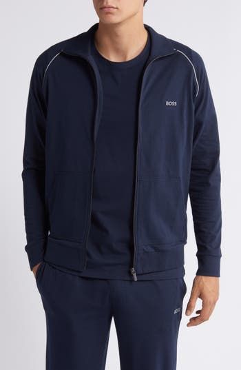 Lightweight and layerable, this jacket made of a soft cotton knit sports handy front pockets and plenty of enhanced stretch for easy movement. Front zip closure Stand collar Split kangaroo pocket 95% cotton, 5% elastane Machine wash, tumble dry Imported Functional Fall Cotton Sweatshirt, Functional Cotton Hoodie With Pockets, Functional Relaxed Fit Outerwear For Loungewear, Navy Cotton Track Jacket For Fall, Navy Casual Sweatshirt With Pockets, Functional Cotton Track Jacket For Fall, Cotton Sportswear Outerwear With Pockets, Casual Sports Sweatshirt With Side Pockets, Casual Sweatshirt With Side Pockets For Sports