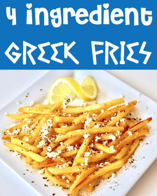 french fries on a white plate with lemon wedges and pepper sprinkles