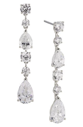 Complete your look with the sparkling glamour of these linear drop earrings set with faceted stones. 1 5/8" drop; 1/4" width Post back Rhodium or 18k-gold plate/cubic zirconia Imported Cubic Zirconia Drop Linear Earrings For Evening, Formal Fine Jewelry Linear Cubic Zirconia Earrings, Classic Cubic Zirconia Long Drop Linear Earrings, Long Drop Linear Earrings With Diamond Accents, Classic Drop Linear Earrings With Diamond Accents, Formal Linear Earrings With Cubic Zirconia And Prong Setting, Classic Linear Earrings With Diamond Accents, Classic Long Drop Linear Earrings With Diamond Accents, Evening Cubic Zirconia Dangle Linear Earrings