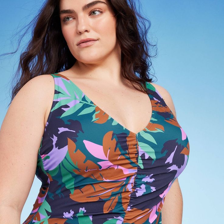 Upgrade your swim wardrobe ahead of beach season with this Shirred Plunge One-Piece Swimsuit from Shade & Shore™. This one-piece swimsuit covered with a modern multicolor floral print features a plunging V-neckline and a shirred construction with a flattering high-leg silhouette. Made from soft fabric with spandex and full lining, this medium-coverage swimsuit offers flexible comfort both in and out of the water. The sewn-in cups offer confident coverage, and the pull-on style allows for easy we Coverage Swimsuit, High Neck Swim, Cheeky One Piece Swimsuit, Cupshe Swimsuits, Plunging One Piece Swimsuit, Cut Out One Piece, Swimsuit Shops, Swimsuit Cover, High Leg