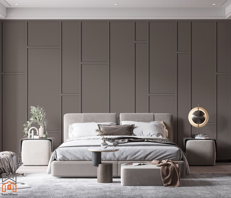 a modern bedroom with grey walls and furniture