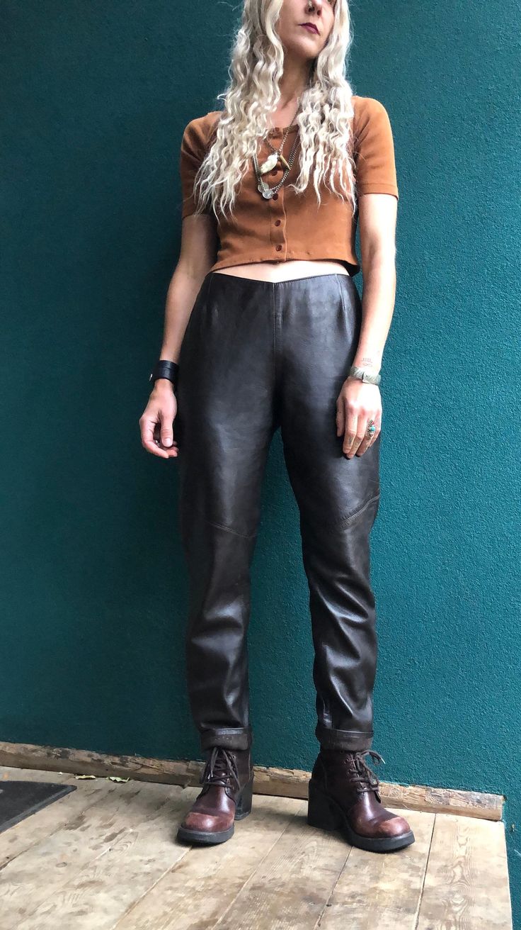 Gorgeous  Giovanni Valentino Couture Leather Pants - Butter soft genuine leather - Deep moody brown tone - Top of pants in lined in a satin type lining - Side zipper - Sleek look with no pockets - Diagonal stitch detailing just above the knee - Straight relaxed fit - Fits like a size US 6- 8 ( depending on your measurements) - Slight V cut on waist - Sits mid/ high waist - In good, vintage condition showing minor wear and age - Measurements taken lying flat: ( compare with a garment you love ) Brown Faux Leather Full-length Pants, Brown Full-length Faux Leather Pants, Brown Full Length Faux Leather Pants, Classic Fitted Faux Leather Bottoms, Fitted Faux Leather Classic Bottoms, Brown Full-length Leather Pants For Fall, Brown Full Length Leather Pants For Fall, Full Length Brown Leather Pants For Fall, Brown Faux Leather Bottoms With Belt Loops