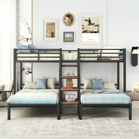 two bunk beds with blue and white bedding in a room