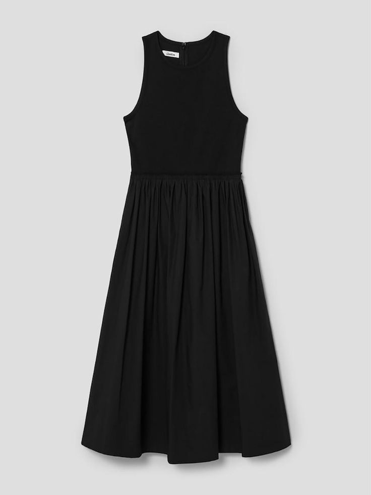 This is a feminine and modern dress by The Aperture that is made out of high quality and sturdy material. With distinctive mood of the design and comfortable wear, you can style it for your casual daily outfit.- Jersey fabric on the top and light cotton fabric skirt- Wide neckline and deep armhole- Trendy and feminine mood Elegant Black Cotton Maxi Dress, Fitted Black Cotton Midi Dress, Black Fitted Cotton Midi Dress, Black Full Skirt Dress For Summer, Black Full Skirt Midi Dress For Summer, Black Midi Dress With Full Skirt For Summer, Cotton Dress With Voluminous Skirt For Daywear, Black Midi Dress With Gathered Skirt, Black Dresses With Relaxed Skirt For Spring