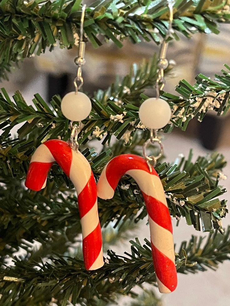 "Adorable candy canes for your ears! 2\" earrings" Christmas Earrings Handmade, Leg Lamp, Handmade Candy, Candy Cane Christmas, 2 Earrings, Christmas Candy Cane, Candy Canes, Christmas Earrings, Block Lettering