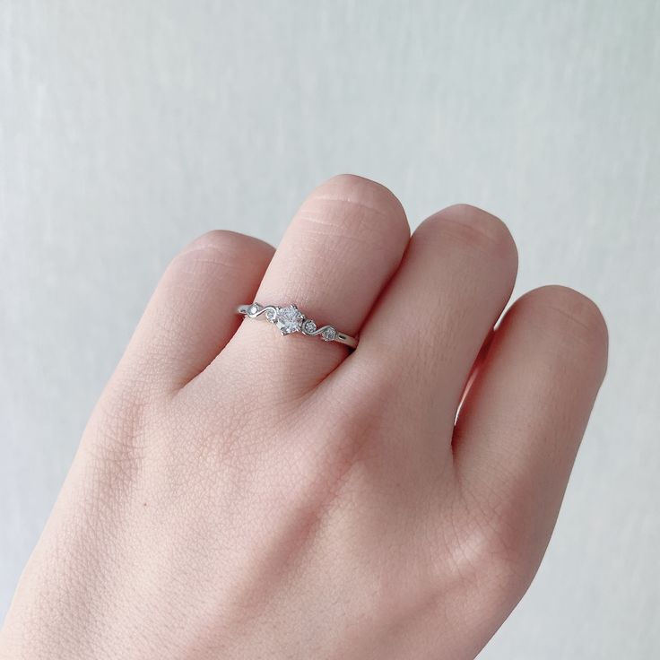 ✩ Made of solid sterling silver. Allergy-free. Tarnish resistant. ✩ Rhodium/rose gold finish adds extra shine and ensure durability ✩ Finest diamond simulants, shine bright like real diamonds ✩ Brilliant cut ✩ Main stone carat weight: 0.25 ✩ Shank width 1.5 mm ✩ Approx. weight: 1.4 ✩ Ship beautifully packaged Cubic Zirconia Midi Rings For Promise, Rose Gold Sterling Silver Crystal Ring For Anniversary, Sterling Silver Rose Gold Diamond Promise Ring, Rose Gold Sterling Silver Diamond Promise Ring, Dainty White Gold Crystal Promise Ring, Rose Gold Sterling Silver Crystal Ring For Promise, Delicate Silver Diamond Ring With Vs Clarity, Rose Gold Cubic Zirconia Birthstone Promise Ring, Promise Rose Gold Birthstone Ring With Cubic Zirconia