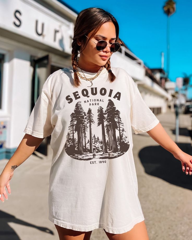 A thick, structured unisex tee that's also super soft and breathable Features California's famous Sequoia National Park 100% ring-spun cotton * Garment-dyed * Relaxed fit Care Instructions * Turn inside out and machine wash cold on delicate cycle * Dry on low heat setting * Do not bleach * Do not iron directly on design Processing and Shipping Times * Please allow 2-10 business days for your order to be processed and made * Standard shipping takes 3-5 days * Please note that these times are esti Sequoia National Park, Adventure Shirt, Outdoor Shirt, Graphic Tee Design, Unisex Tshirt, Nature Lover, Comfort Colors, National Park, Favorite Outfit